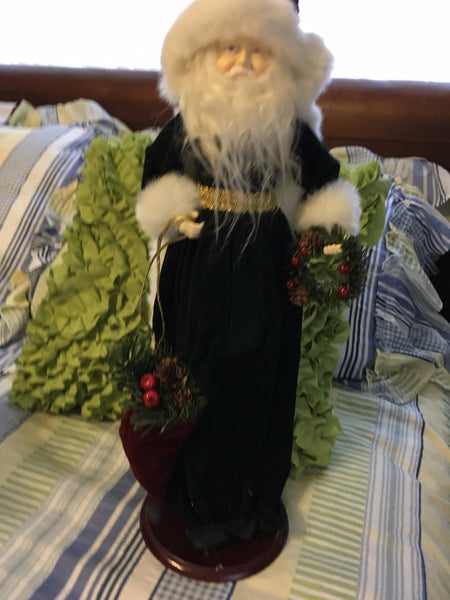 Vintage Table Top Santa In White And Green Holding A Wreath And Bag Of 