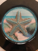 PLATE CHARGER BLACK PLASTIC ROUND DECOUPAGED Upcycled Repurposed Wall Art or Shelf Sitter BEJEWELED STARFISH Beach Coastal Home Decor Gift - JAMsCraftCloset