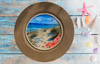 PLATE CHARGER LIGHT BROWN WOOD GRAIN PLASTIC ROUND DECOUPAGED Upcycled Repurposed Wall Art or Shelf Sitter HAPPIEST BY THE SEA Beach Coastal Home Decor Gift - JAMsCraftCloset
