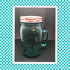 Green Glass Quart Jar With Handle 7 Inches Tall 3 1/2 Inches in Diameter Gift Kitchen Decor Great Gift Idea Collectible Embossed Butterfly and the Words...SIMPLE HOMEMADE GOODNESS...Made in the USA ...NOT for Home Canning...Lid With Straw Opening...