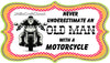 Motorcycle License Vanity Plate Custom Tag Front Clever Funny Unique NEVER UNDERESTIMATE AN OLD MAN Sublimation on Metal - JAMsCraftCloset